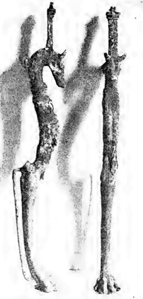 Villa of T. Siminius Stephanus, fondo Barbatelli. 24th November 1899. Found at a depth of 3.80m, found between the ash layers. Two of three table feet, well executed, the top finished with a head of a bitch, and the lower finished with a canine paw: The bitch had a collar and two tiers of breasts. There were traces of silver coating. See Notizie degli Scavi di Antichità, 1899, p. 441-2, fig. 4a, 4b.