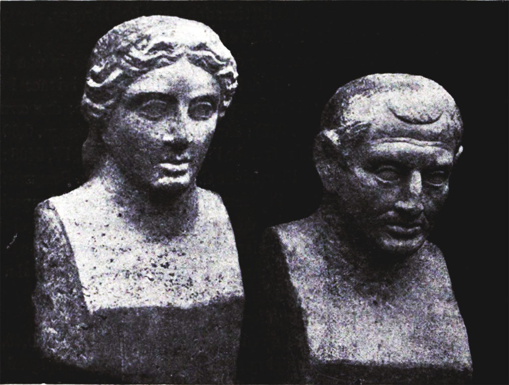 Pompeii, Villa rustica nel Fondo di Antonio Prisco. Tomb “D”.
Two travertine portraits busts found in a semi-circular niche below the marble plaque on the west side of the tomb.
See Notizie degli Scavi di Antichità, 1921, p. 422, fig. 4.
