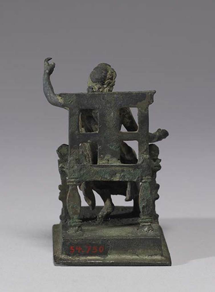 Boscoreale, Villa rustica in fondo D’Acunzo. Room 12, lararium. 
Bronze statuette of seated Jupiter, rear view.
Photo courtesy of The Walters Art Museum, Baltimore. Inventory number 54.750.
http://thewalters.org/
Creative Commons Attribution-ShareAlike 3.0 Unported Licence