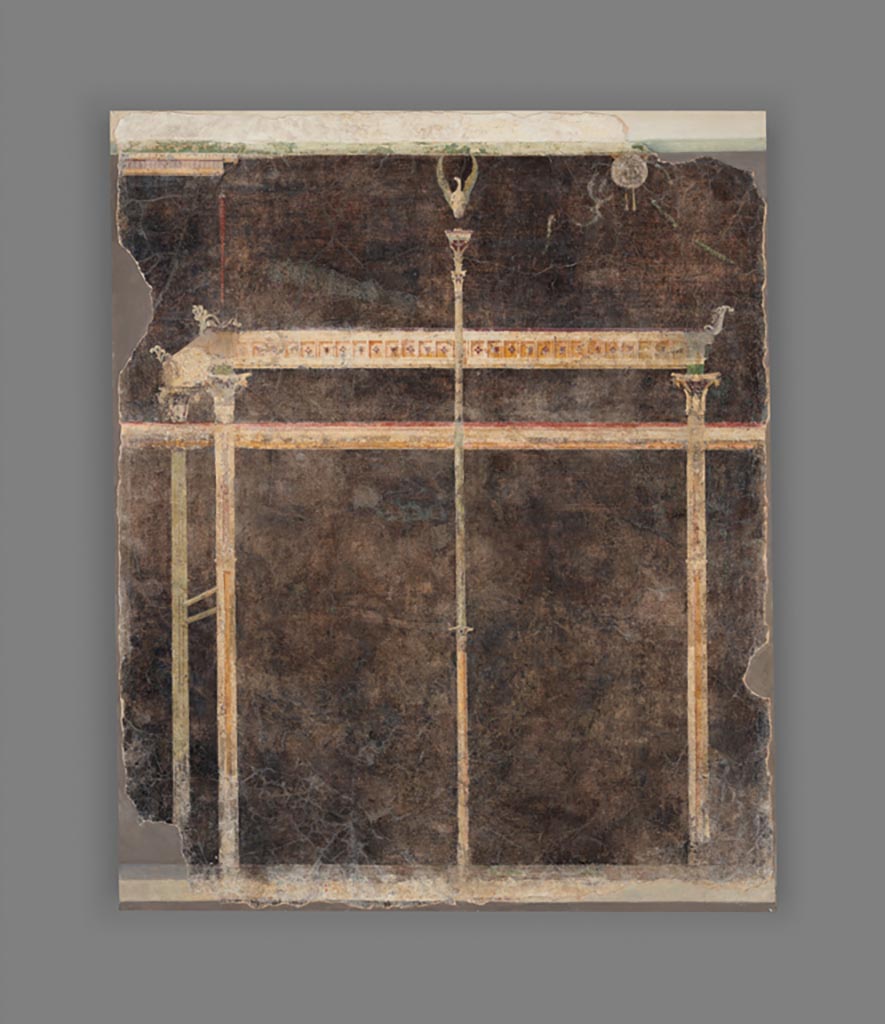Boscoreale. Villa of Numerius Popidius Florus. Room 4. Wall Panel from a black ground frescoed room with architectural design.
Digital image courtesy of the Getty's Open Content Program. Now in the Getty Museum, inventory number 72.AG.79.1.
One of three fresco panels that decorated the same room (Room 4) of the Villa of Numerius Popidius Florus at Boscoreale (see also 72.AG.79.2 and 70.AG.91). These frescoes display fanciful architectural compositions on a black background. Three attenuated columns topped by Corinthian capitals support a narrow decorative entablature with floral acroteria (architectural ornaments) at the corners. A slender candelabrum in the middle of the panel is surmounted by a swan. On the upper right corner of the fresco is a circular shield with ribbons and garlands. The painting style, categorized by scholars as the Third Style of Roman wall painting, features small vignettes and elegant ornamental architecture.