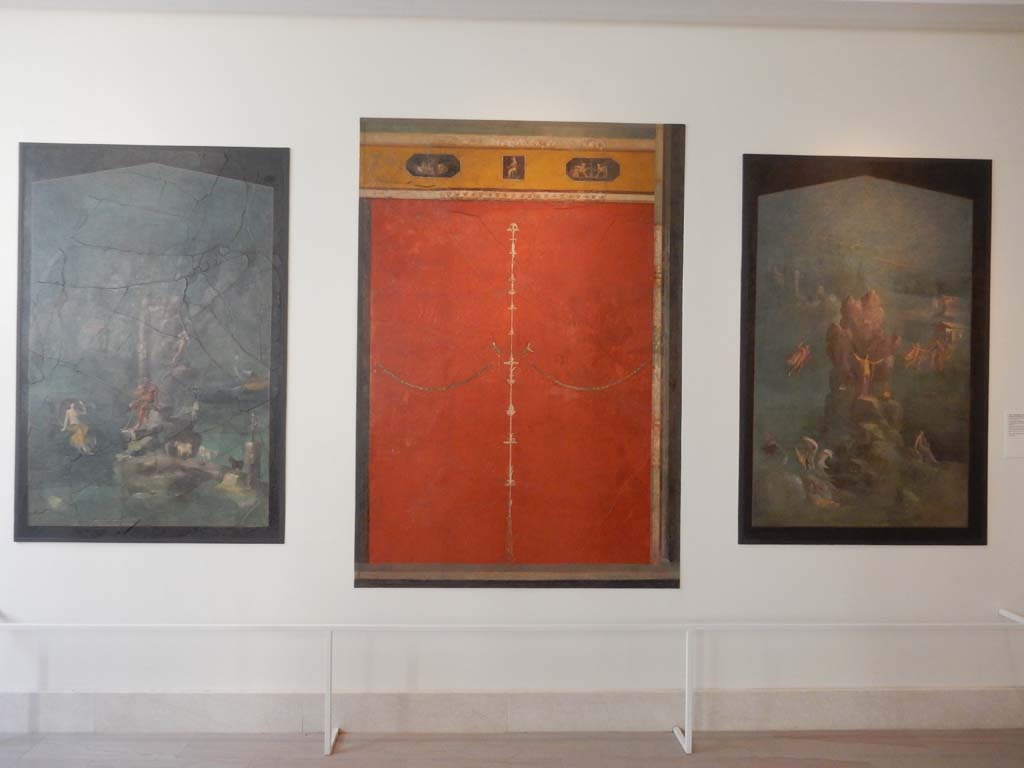 Villa of Agrippa Postumus, Boscotrecase. January 2018. Room 19, three wall paintings. 
Left to right – landscape with Polyphemus and Galatea, red panel with candelabrum, landscape with Perseus and Andromeda.
Metropolitan Museum. Rogers Fund. Inventory numbers 20.192.17, 20.192.13 and 20.192.16.
Photo courtesy of Buzz Ferebee.
