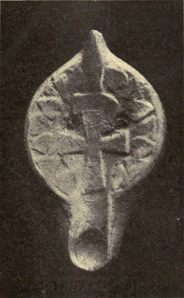 Villa of Agrippa Postumus Boscotrecase. 1922. One of two lamps found in south-west corner of portico. 
See Notizie degli Scavi di Antichità, 1922, p. 477 Fig.15.
