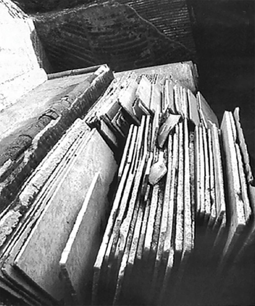 Complesso dei triclini in località Moregine a Pompei. Some of the around 200 marble slabs found neatly stacked in the kitchen.
According to Perna, Antonelli and Lazzarini, in an archaeometric analysis of the greco scritto marble slabs from the Edificio dei Triclinii, discovered at Murecine in Pompeii’s suburbs in 1999–2000, a total of 14 samples were collected and subjected to standard X-ray diffraction (XRD), optical microscopy (OM) on thin sections and stable isotope ratio analysis (SIRA) to assess the stone’s identity and provenance. The results of this study substantiate the hypothesis (already put forward and based on a macroscopic identification by Perna and Scognamiglio) that the stone originates from the Hasançavuşlar quarries near Ephesus in Asia Minor.
See Perna S., Antonelli F., Lazzarini L., 2022.  Archaeometric analysis of the ‘greco scritto’ marble slabs from the Edificio dei Triclinii at Murecine. Wiley Online Library.