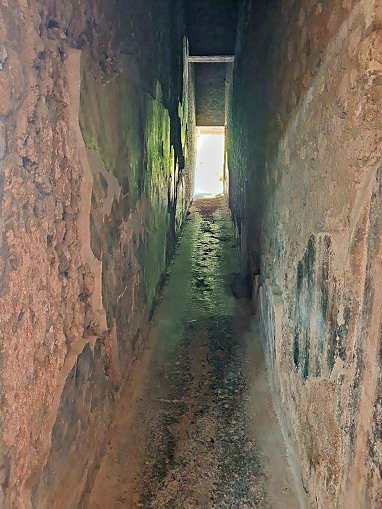 Oplontis Villa of Poppea, October 2023. 
Corridor 3 leading from room 4, north-east corner, to east portico 34. Photo courtesy of Giuseppe Ciaramella.