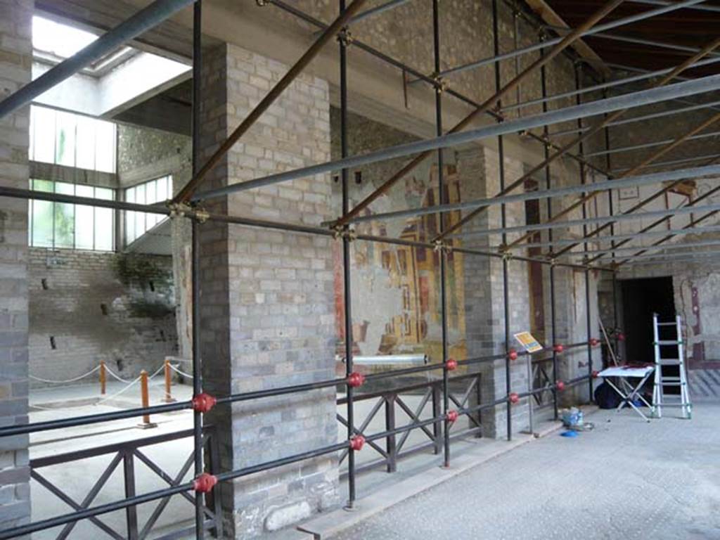 Oplontis, May 2010. Room 4, south side. Looking through pilasters into the atrium, room 5. On the right is the doorway into room 9. Photo courtesy of Buzz Ferebee.