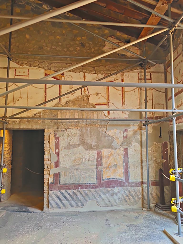 Oplontis Villa of Poppea, October 2023. 
Room 4, west wall with doorway to room 9, on left. Photo courtesy of Giuseppe Ciaramella.