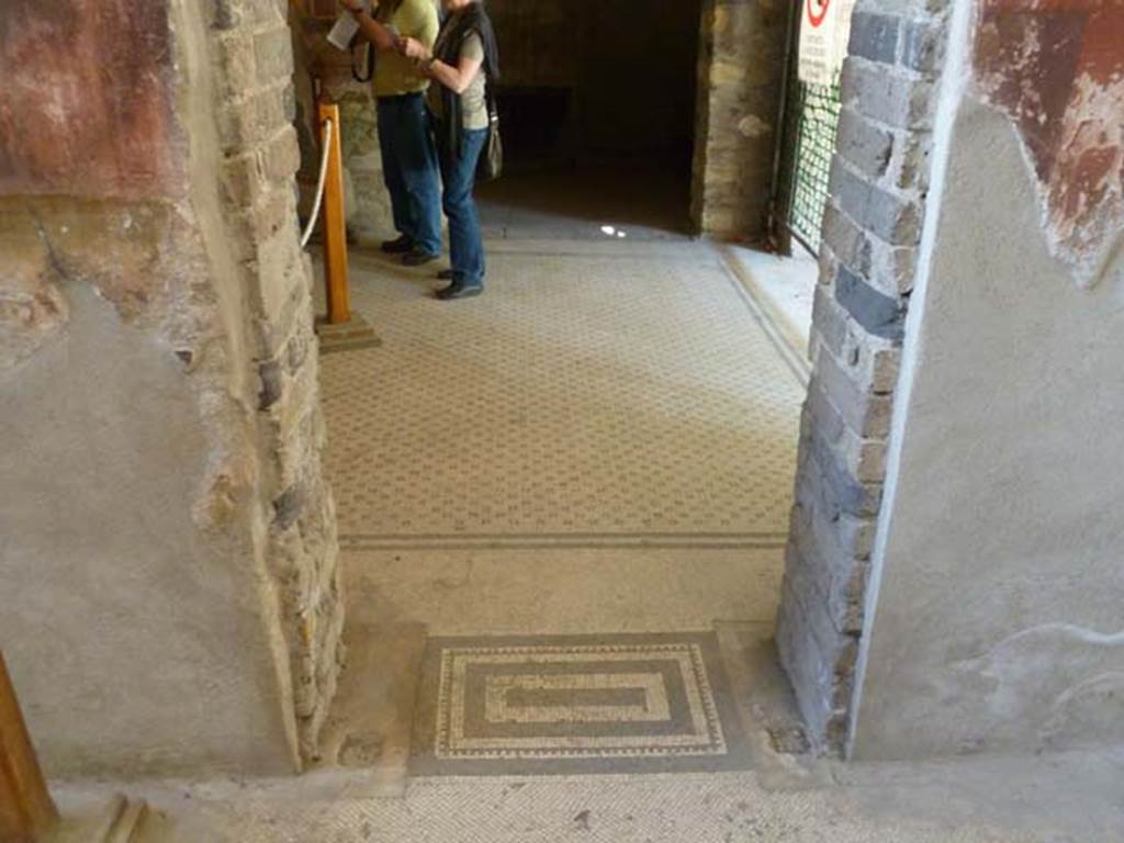 Oplontis, May 2011. Doorway from room 15 with mosaic threshold, into room 14, the triclinium. Looking east. Photo courtesy of Michael Binns