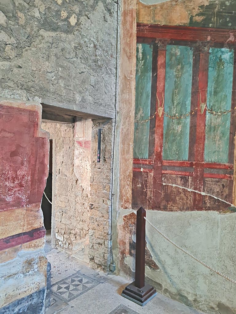 Oplontis Villa of Poppea, October 2023. 
Room 15, north-east corner with doorway to room 16, in north wall. Photo courtesy of Giuseppe Ciaramella.