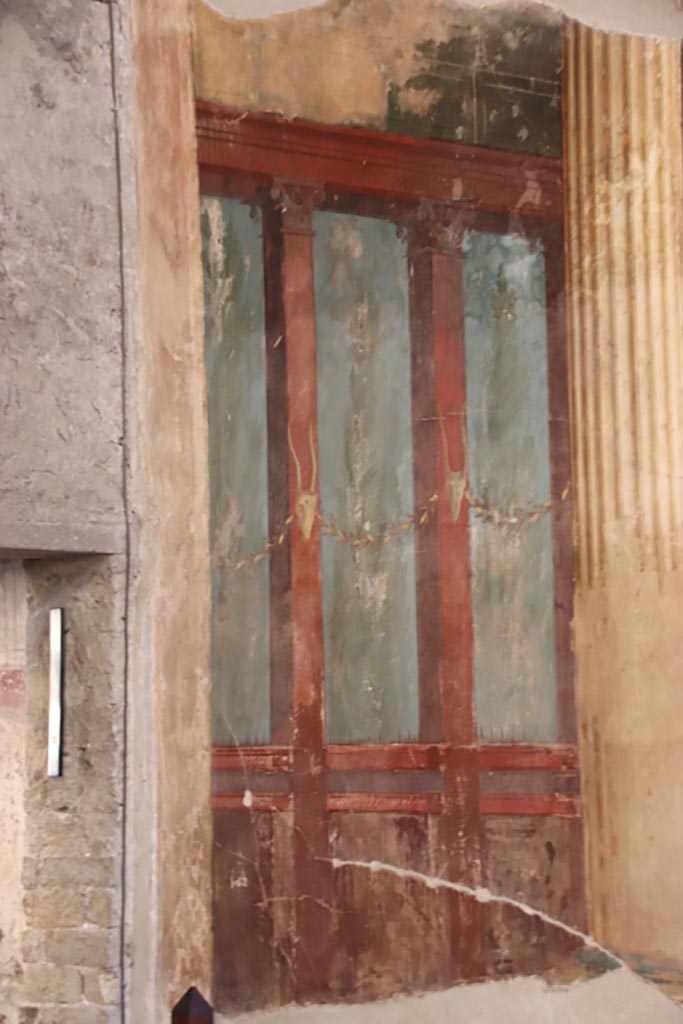 Oplontis Villa of Poppea, October 2022. 
Room 15, painted decoration on north wall in north-east corner next to doorway to room 16. Photo courtesy of Klaus Heese.