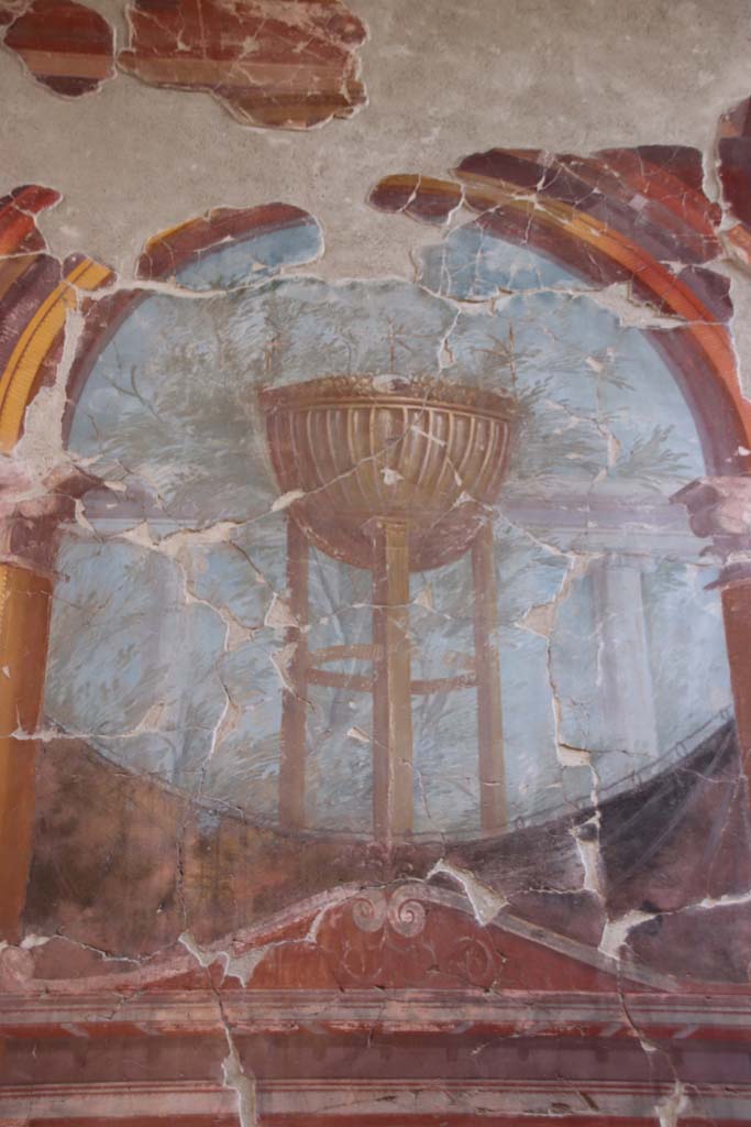 Oplontis, Villa of Poppea, September 2021. 
Room 15, east wall, detail of painting of the Delphic tripod. Photo courtesy of Klaus Heese.
