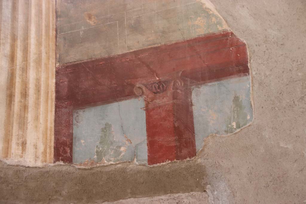 Oplontis Villa of Poppea, September 2021. 
Room 15, detail of decorative painting above doorway to room 14, in east wall in south-east corner. Photo courtesy of Klaus Heese.