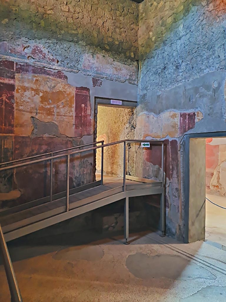 Oplontis Villa of Poppea, October 2023. 
Room 18, looking towards east wall and south-east corner with doorway to room 17, in centre, and room 8, on right. 
Photo courtesy of Giuseppe Ciaramella.
