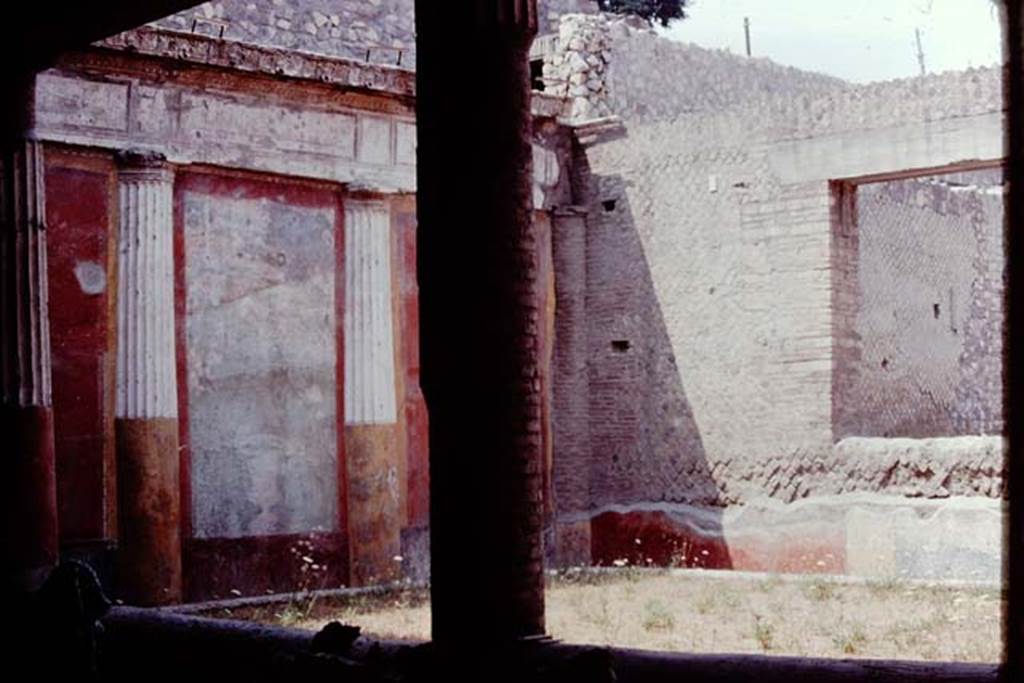 Oplontis, 1974. Room 20, Looking towards north-west corner, and north wall with window into room 21, the grand oecus. Photo by Stanley A. Jashemski.   
Source: The Wilhelmina and Stanley A. Jashemski archive in the University of Maryland Library, Special Collections (See collection page) and made available under the Creative Commons Attribution-Non Commercial License v.4. See Licence and use details. J74f0637
