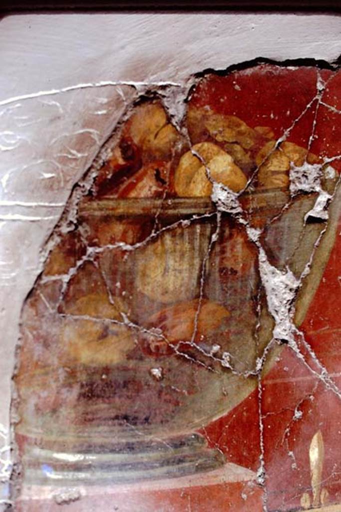 Oplontis, 1975. Room 23, detail of bowl of fruit from east end of south wall. Photo by Stanley A. Jashemski.   
Source: The Wilhelmina and Stanley A. Jashemski archive in the University of Maryland Library, Special Collections (See collection page) and made available under the Creative Commons Attribution-Non Commercial License v.4. See Licence and use details. J75f0246