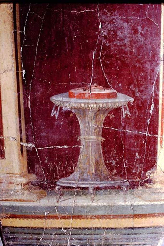 Oplontis, 1972 (or 1973). Room 23 painted table. Photo by Stanley A. Jashemski. 
Source: The Wilhelmina and Stanley A. Jashemski archive in the University of Maryland Library, Special Collections (See collection page) and made available under the Creative Commons Attribution-Non Commercial License v.4. See Licence and use details. J72f0259