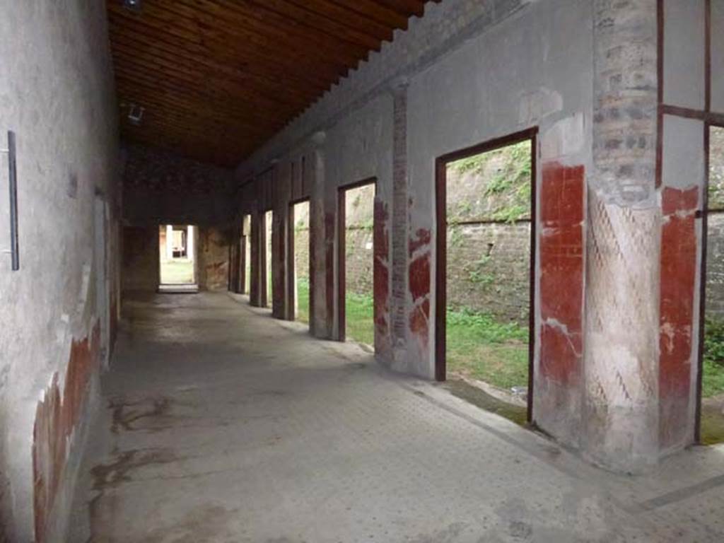 Oplontis, September 2011. Room 24 the southern portico, to the left would lead to portico 40, of the south-eastern peristyle, room 59. Photo courtesy of Michael Binns.