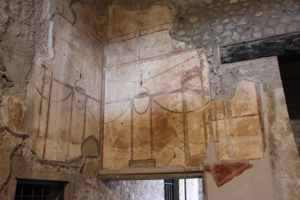 Oplontis Villa of Poppea, May 2024.  
Room 27, looking south in upper south-west corner towards doorway to room 22, on left, and room 1, on right. Photo courtesy of Klaus Heese.