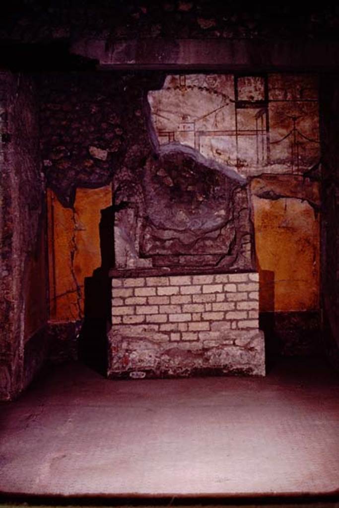 Oplontis, 1974. Room 27, lararium against the west wall. Photo by Stanley A. Jashemski.   
Source: The Wilhelmina and Stanley A. Jashemski archive in the University of Maryland Library, Special Collections (See collection page) and made available under the Creative Commons Attribution-Non Commercial License v.4. See Licence and use details. J74f0663