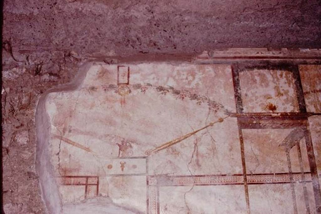 Oplontis, 1974. Room 27, painted west wall above lararium.  Photo by Stanley A. Jashemski.
Source: The Wilhelmina and Stanley A. Jashemski archive in the University of Maryland Library, Special Collections (See collection page) and made available under the Creative Commons Attribution-Non Commercial License v.4. See Licence and use details.
J74f0665