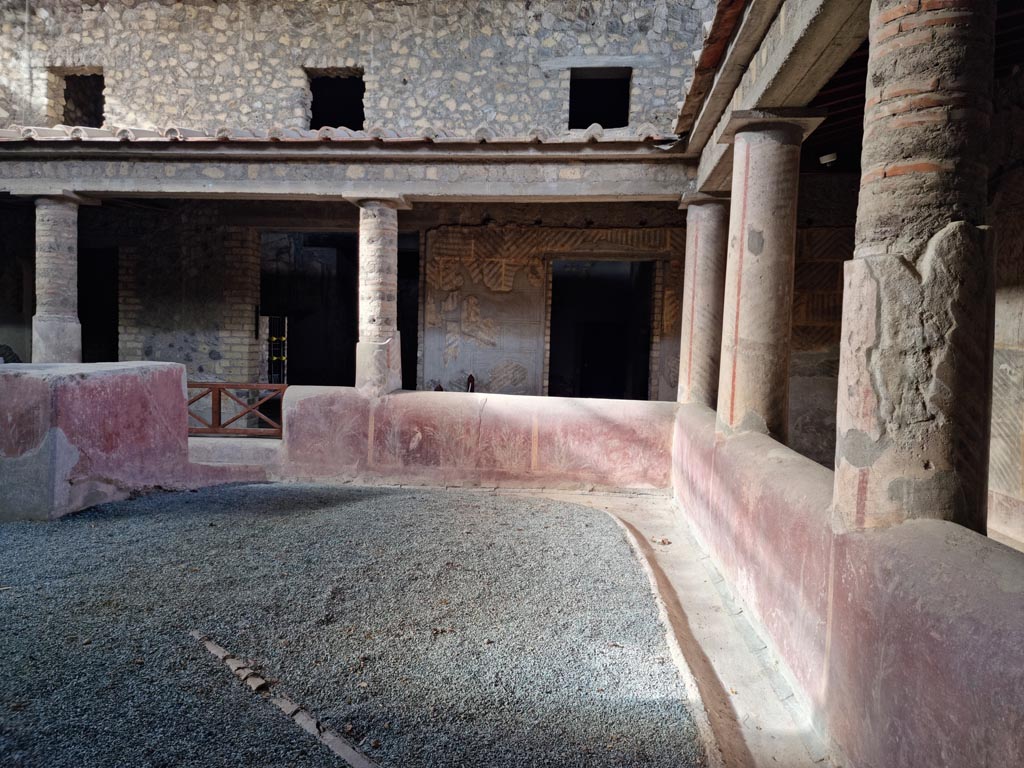 Oplontis Villa of Poppea, January 2023. 
Room 32, looking west along north end of rustic courtyard towards north-west corner. Photo courtesy of Miriam Colomer.