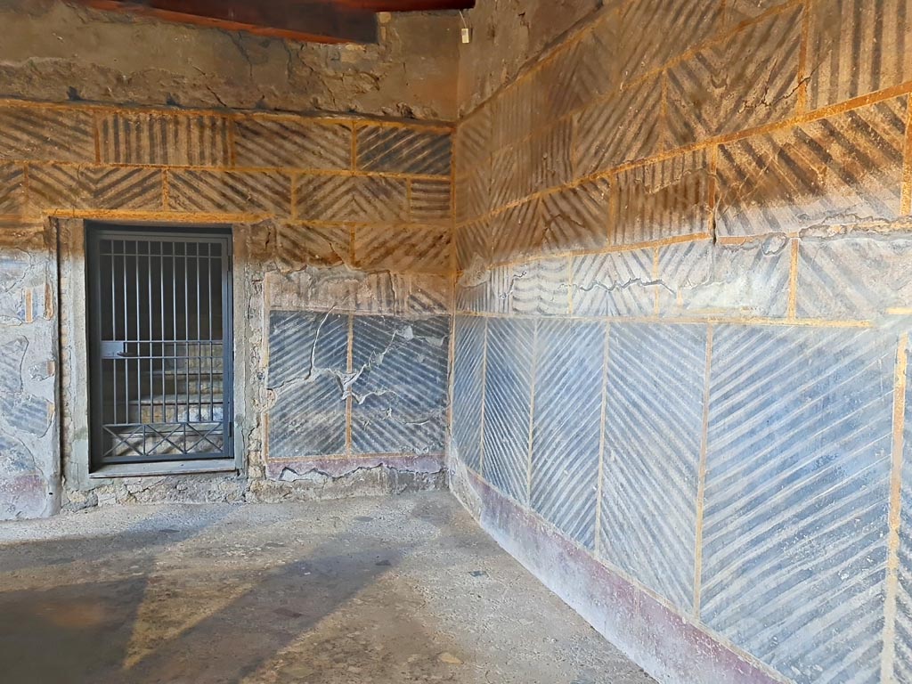 Oplontis Villa of Poppea, October 2023.  
Room 32, doorway to room 42, steps to upper floor, on east side of internal peristyle in south-east corner. 
Photo courtesy of Giuseppe Ciaramella.