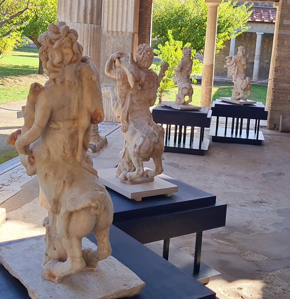 Oplontis Villa of Poppea, October 2023. 
Portico 33, rear view of four statues of the Centaurs on display in room 21. Photo courtesy of Giuseppe Ciaramella.