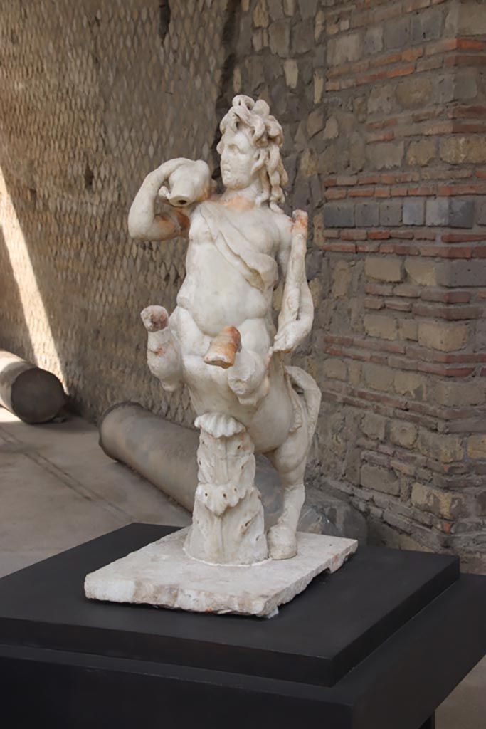 Villa of Poppaea, Oplontis, October 2023. 
One of a group of four centaurs, a female holding a fawn, on display in Room 21.
Photo courtesy of Klaus Heese.