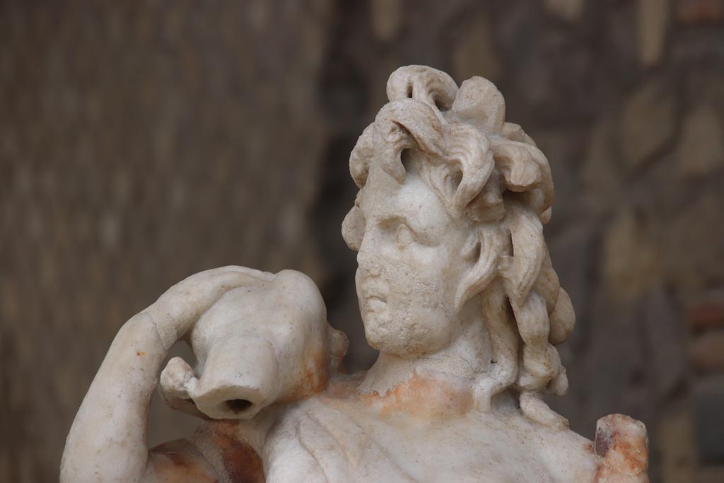 Villa of Poppaea, Oplontis, October 2023. 
Detail of one of a group of four centaurs, a female holding a fawn, on display in Room 21. Photo courtesy of Klaus Heese.