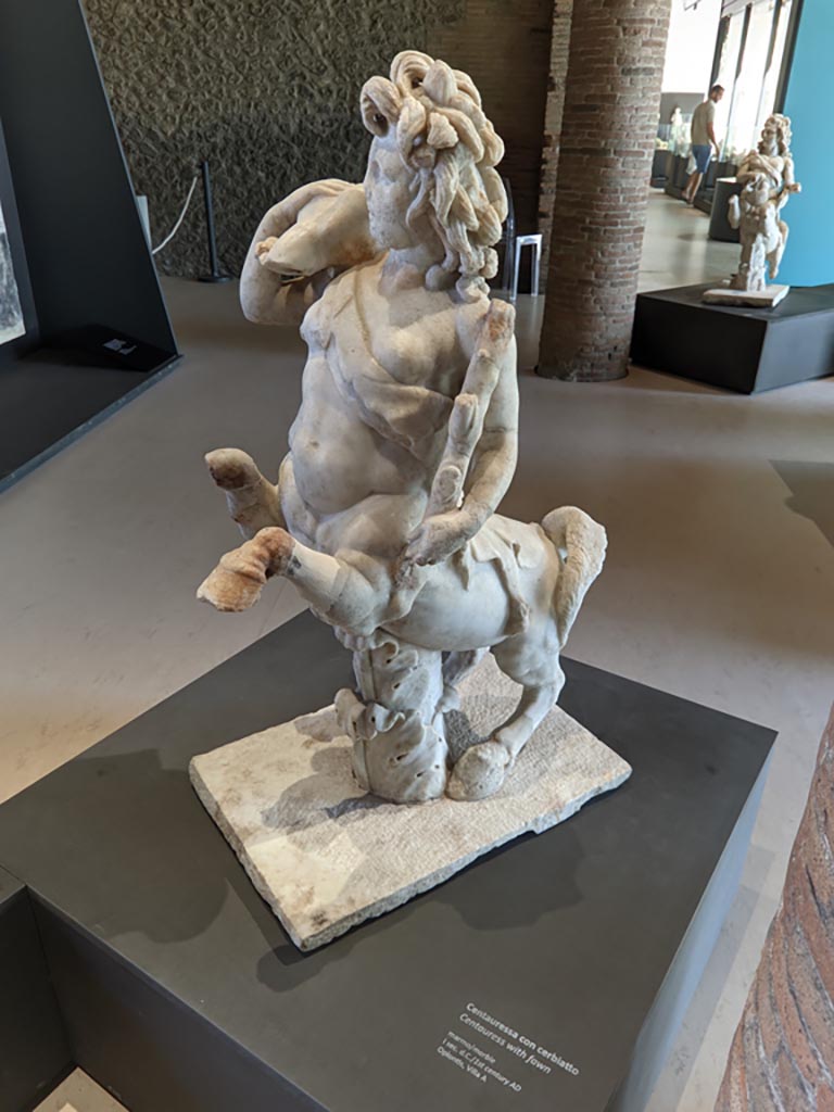 Oplontis Villa of Poppea, April 2022. 
Statuette of a female holding a fawn. Photo courtesy of Giuseppe Ciaramella.