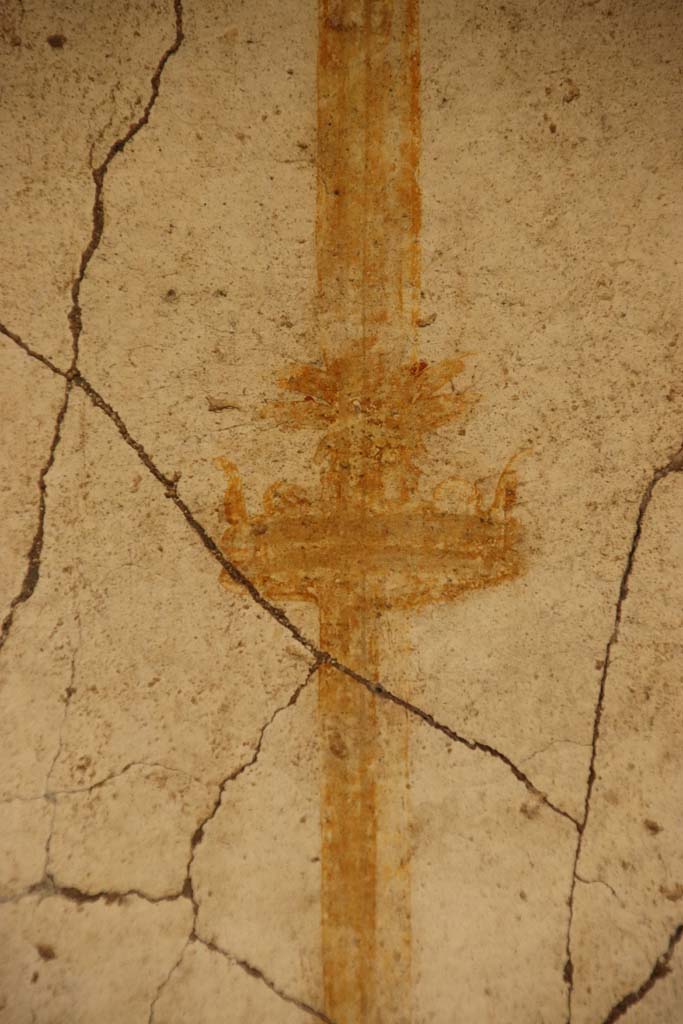 Oplontis Villa of Poppea, October 2020. 
East Portico 34, white painted panel with detail of golden candelabra. Photo courtesy of Klaus Heese.
