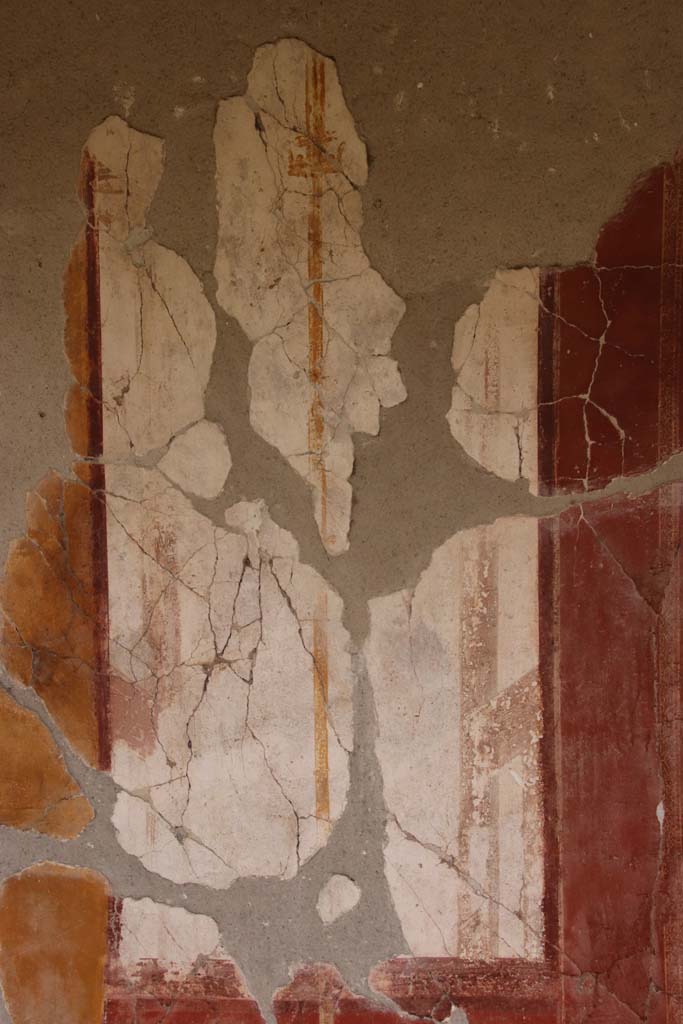 Oplontis Villa of Poppea, October 2020. 
East Portico 34, white painted panel with golden candelabra.Photo courtesy of Klaus Heese.