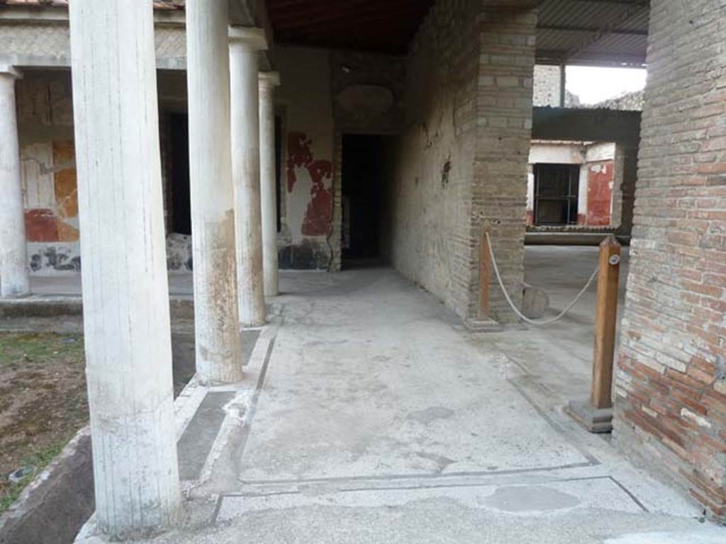Oplontis, September 2015. East Portico 34, looking south from the northern end, doorway to room 21 is on the right.