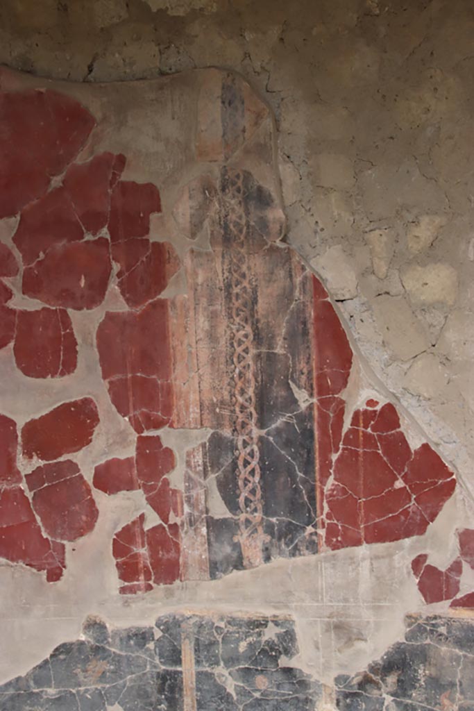 Oplontis Villa of Poppea, May 2024. 
Portico 40, west wall, detail of painted decoration. Photo courtesy of Klaus Heese.
