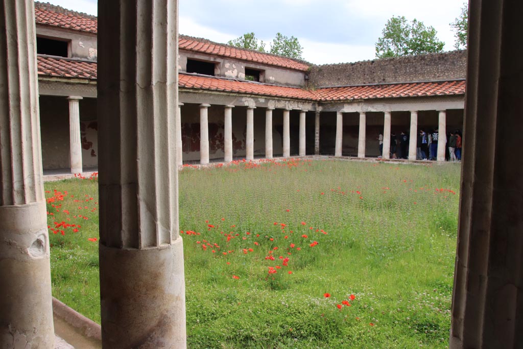 Oplontis Villa of Poppea, May 2024. 
Portico 40, looking towards north wall and north-east corner across peristyle 59. Photo courtesy of Klaus Heese.