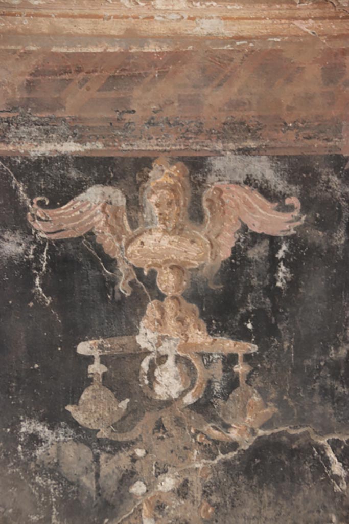 Oplontis Villa of Poppea, May 2024.   
Area 40, detail of top of painted golden twisted candelabra from north wall in north-east corner. 
Photo courtesy of Klaus Heese.