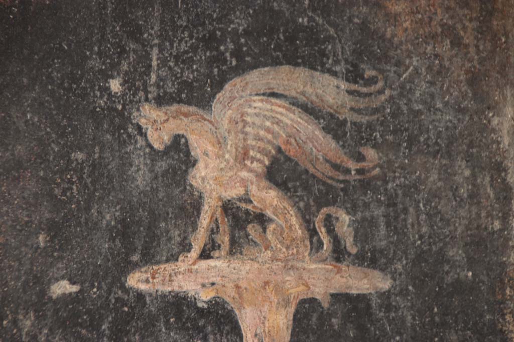 Oplontis Villa of Poppea, September 2021. 
Area 40, detail of painted griffin from north wall, in north-east corner. Photo courtesy of Klaus Heese.