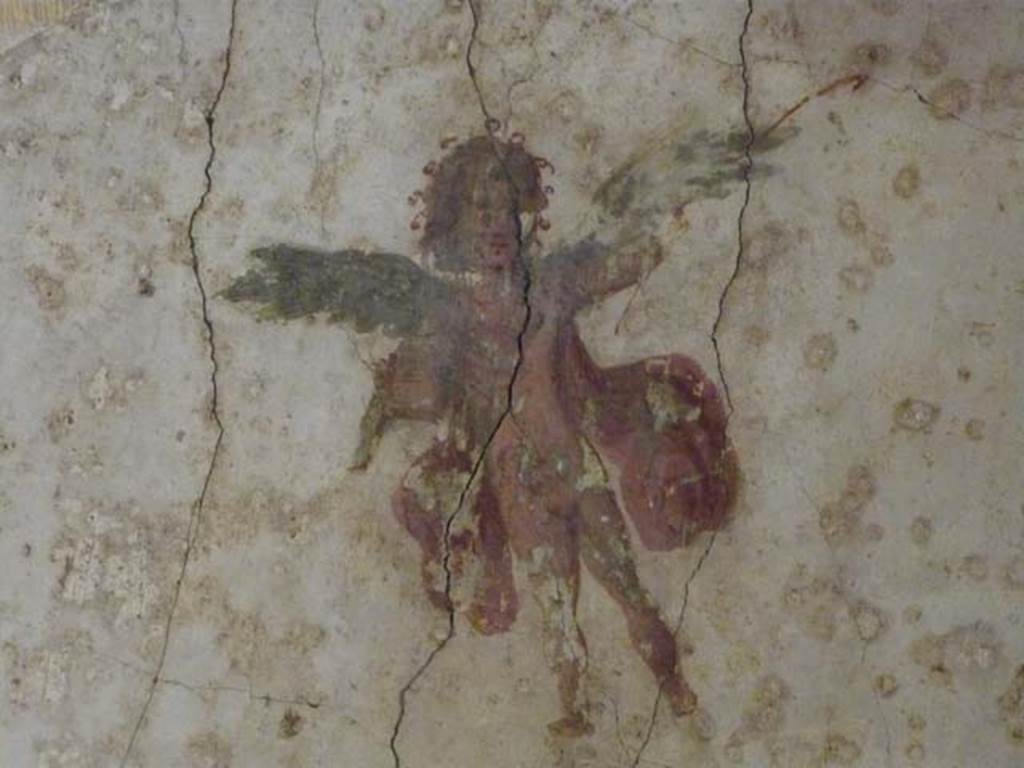 Oplontis, May 2010. Room 41, detail of painted flying figure from north wall of alcove. Photo courtesy of Buzz Ferebee.