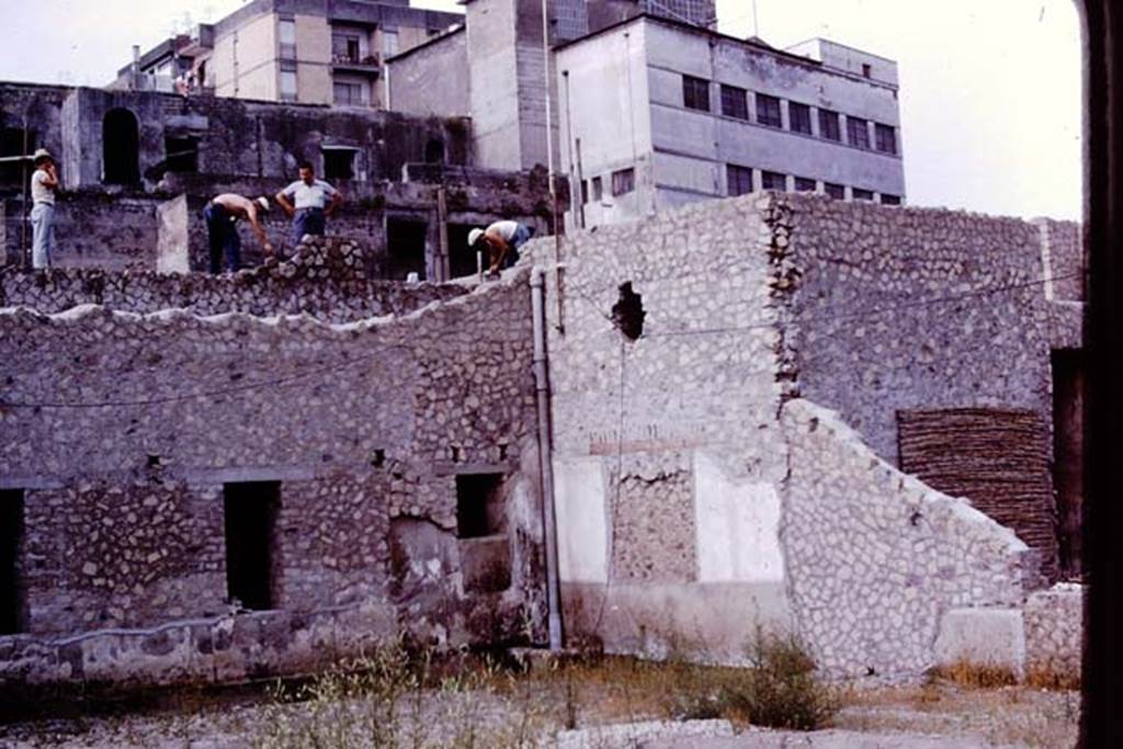 Oplontis, 1976. Area 56, south-west corner of north garden, during rebuilding. Photo by Stanley A. Jashemski.   
Source: The Wilhelmina and Stanley A. Jashemski archive in the University of Maryland Library, Special Collections (See collection page) and made available under the Creative Commons Attribution-Non Commercial License v.4. See Licence and use details. J76f0384