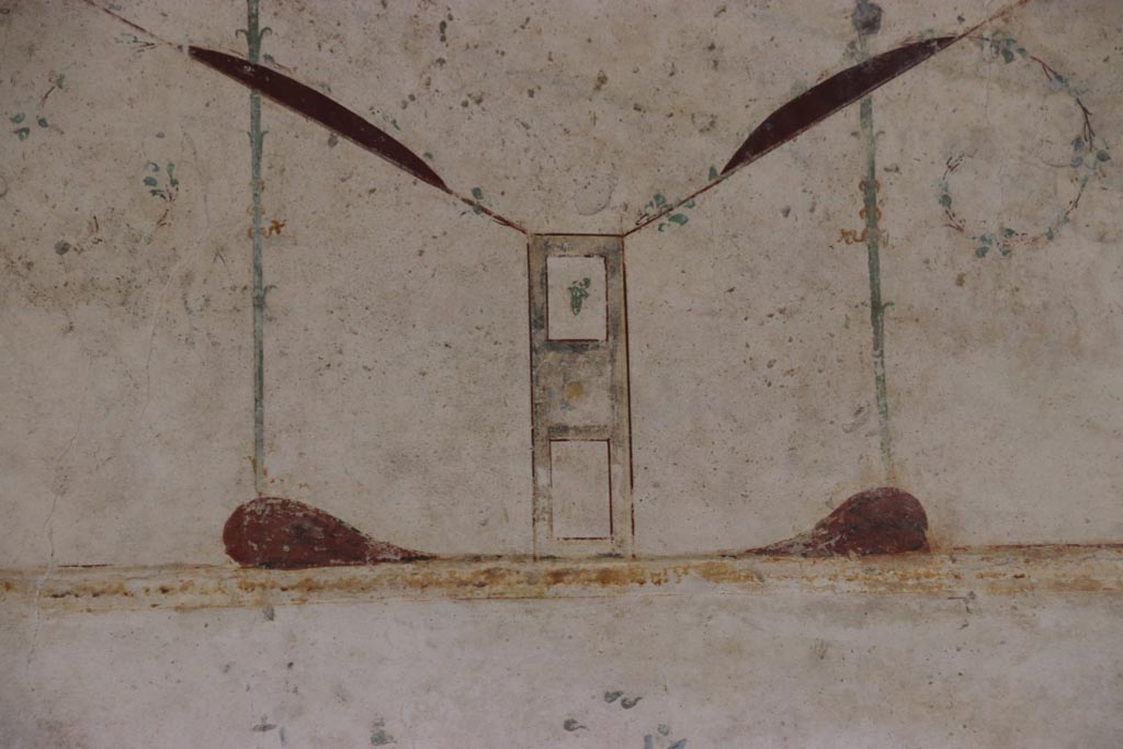 Oplontis Villa of Poppea, May 2024.  
Area 60, detail of painted decoration from upper west wall in south-west corner of portico. Photo courtesy of Klaus Heese.