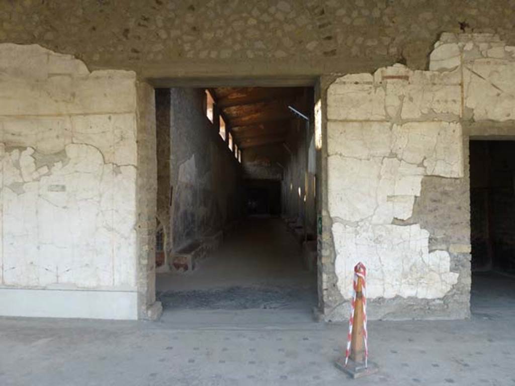 Oplontis, September 2011. Area 60, the west portico wall, with doorway to corridors 46 and 76, with benches/tables in 46. Photo courtesy of Michael Binns.
