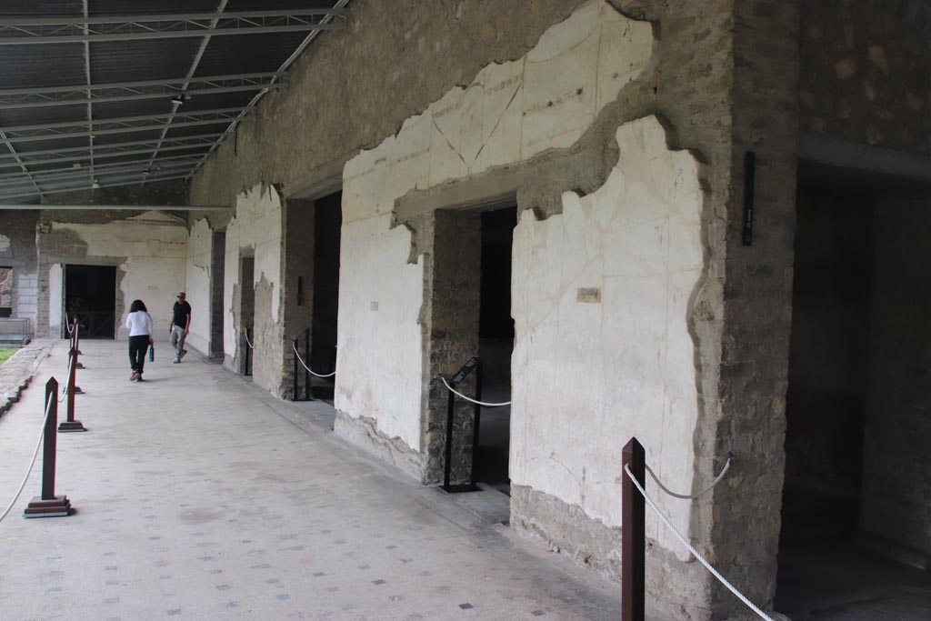 Villa of Poppaea, Oplontis, October 2023. 
Area 60, looking south along west portico, with doorway to room 75, on right. Photo courtesy of Klaus Heese.