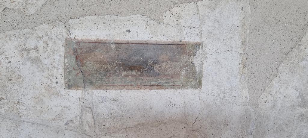 Oplontis Villa of Poppea, January 2023. 
Portico 60, painted panel on south side of doorway to room 72. Photo courtesy of Miriam Colomer.