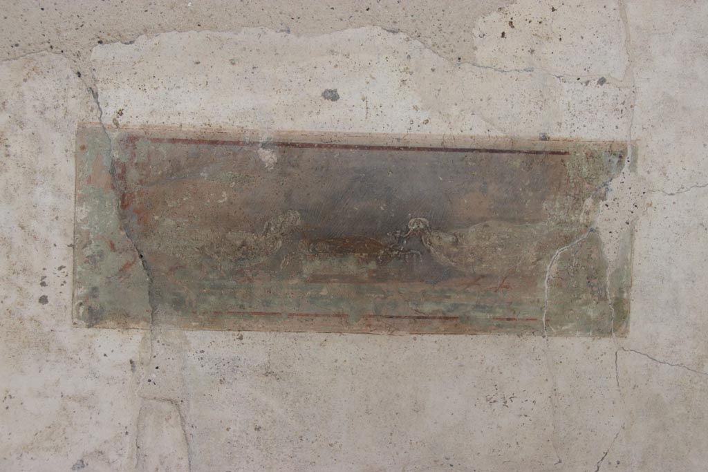 Villa of Poppaea, Oplontis, October 2023. 
Portico 60, painted panel on south (left) side of doorway to room 72. Photo courtesy of Klaus Heese.