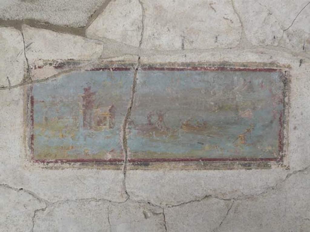 Oplontis, May 2010. Portico 60, west wall, painted decoration south of doorway to room 94. 
Photo courtesy of Buzz Ferebee.