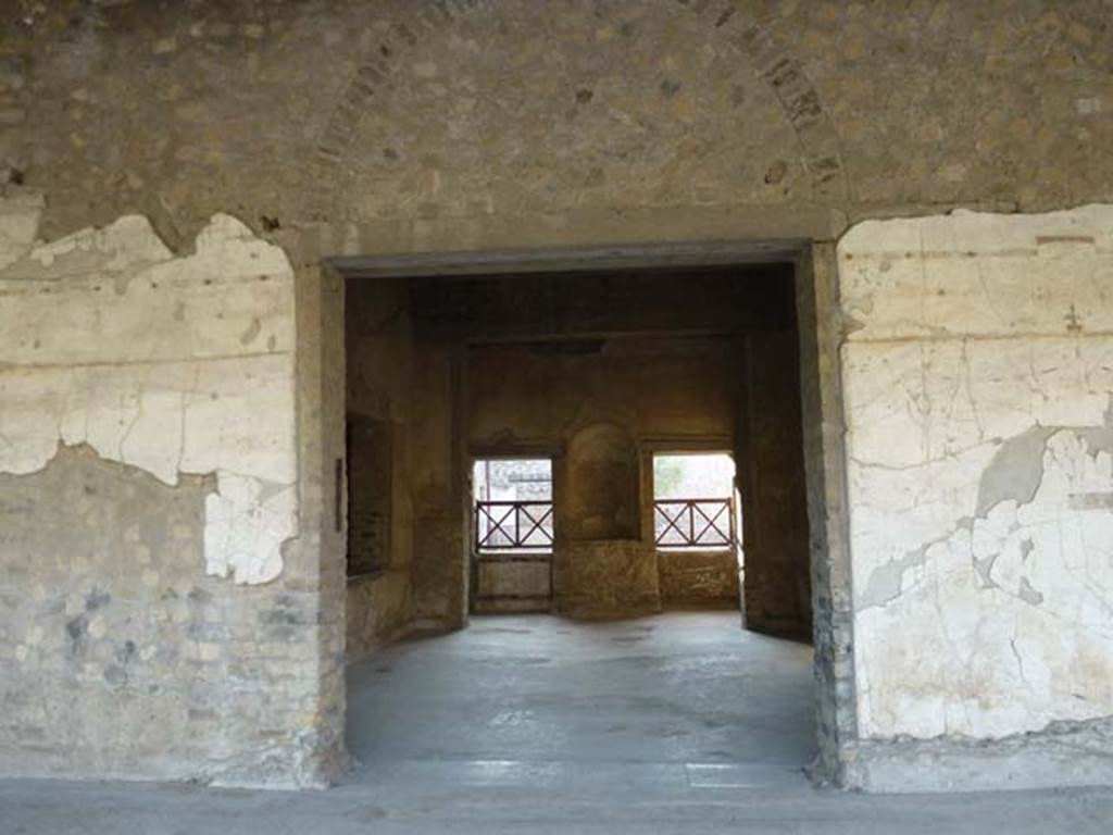 Oplontis, September 2011. Doorway to room 65, looking west. The area at the rear is numbered room 64, on the plan. Photo courtesy of Michael Binns.