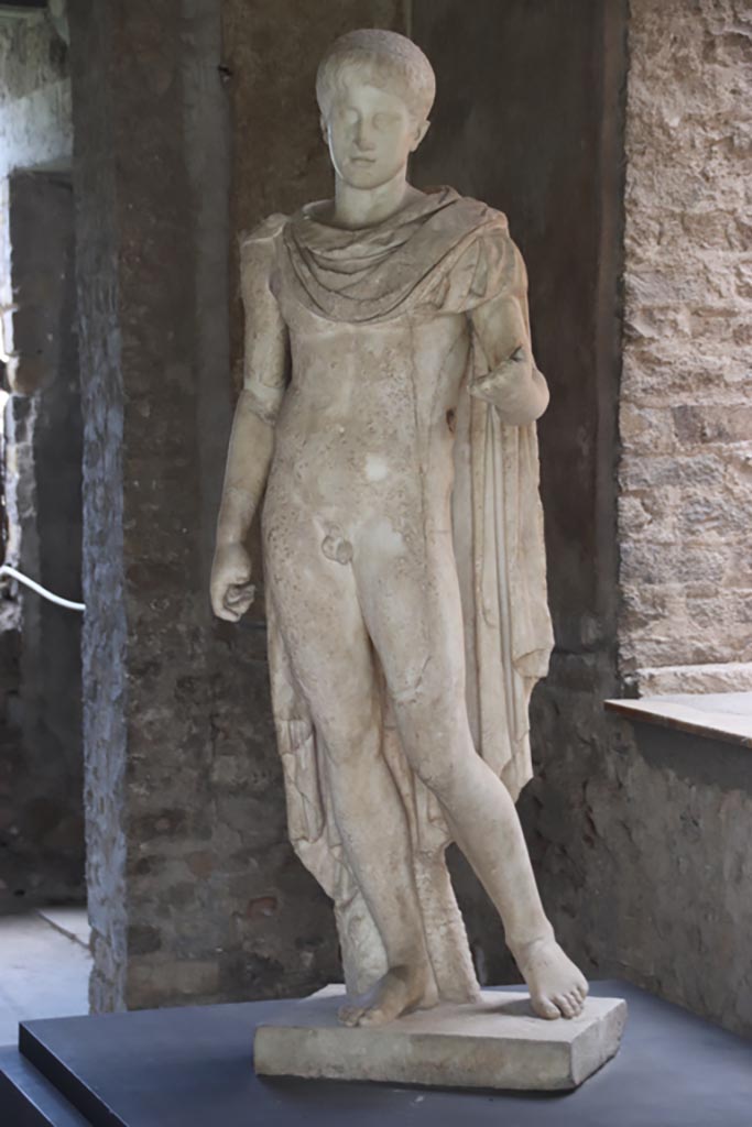 Villa of Poppaea, Oplontis, October 2023.
Room 65, marble statue of Ephebus on display here, but found on east side of pool.
Photo courtesy of Klaus Heese.