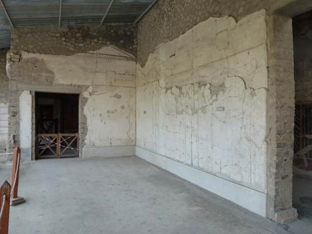 Oplontis, September 2011. Area 60, south-west corner, with doorway to room 66, on left, and doorway to corridors 46/76, on the right.  Photo courtesy of Michael Binns.