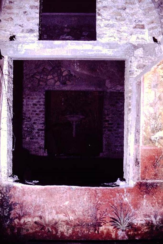 Oplontis, 1976. Room 68, south wall with window into room 65, looking across to window into room 61, a raised courtyard. Photo by Stanley A. Jashemski.   
Source: The Wilhelmina and Stanley A. Jashemski archive in the University of Maryland Library, Special Collections (See collection page) and made available under the Creative Commons Attribution-Non Commercial License v.4s See Licence and use details. J76f0412