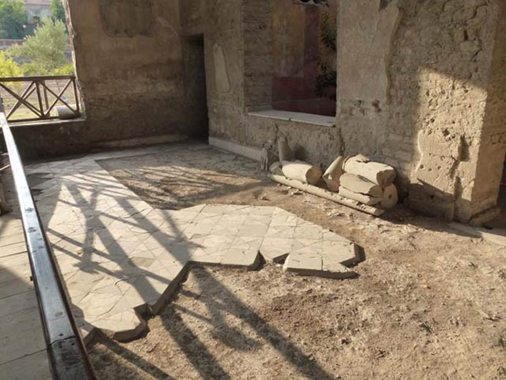 Oplontis, September 2011. Room 69, with decorative floor, looking towards the north-west corner. On the left (west) is the doorway through to the north garden.
The doorway in the north-west corner of the north wall leads into room 71, and the window overlook room 70, a small courtyard garden. Photo courtesy of Michael Binns.