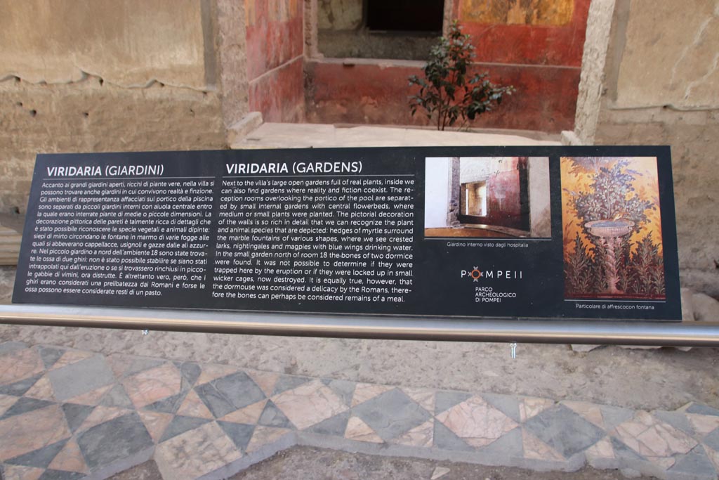 Oplontis Villa of Poppea, October 2022. 
Room 69, south wall with window to room 68 and descriptive noticeboard. Photo courtesy of Klaus Heese.